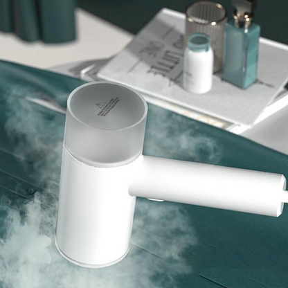 Défroisseur portatif pour vêtements